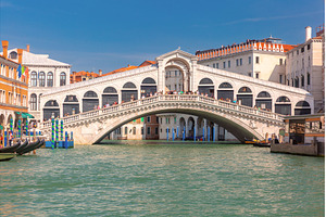 Rialto Bridge and gondolas in Venice, an Architecture Photo by kavalenkava