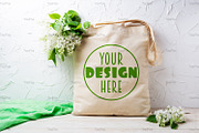 Tote bag mockup with white lilac, a Merchandise Mockup by TasiPas (Thumbnail 1 of 4)