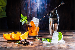 Cocktail with ice and orange, a Food & Drink Photo by Stockphoto by vzwer