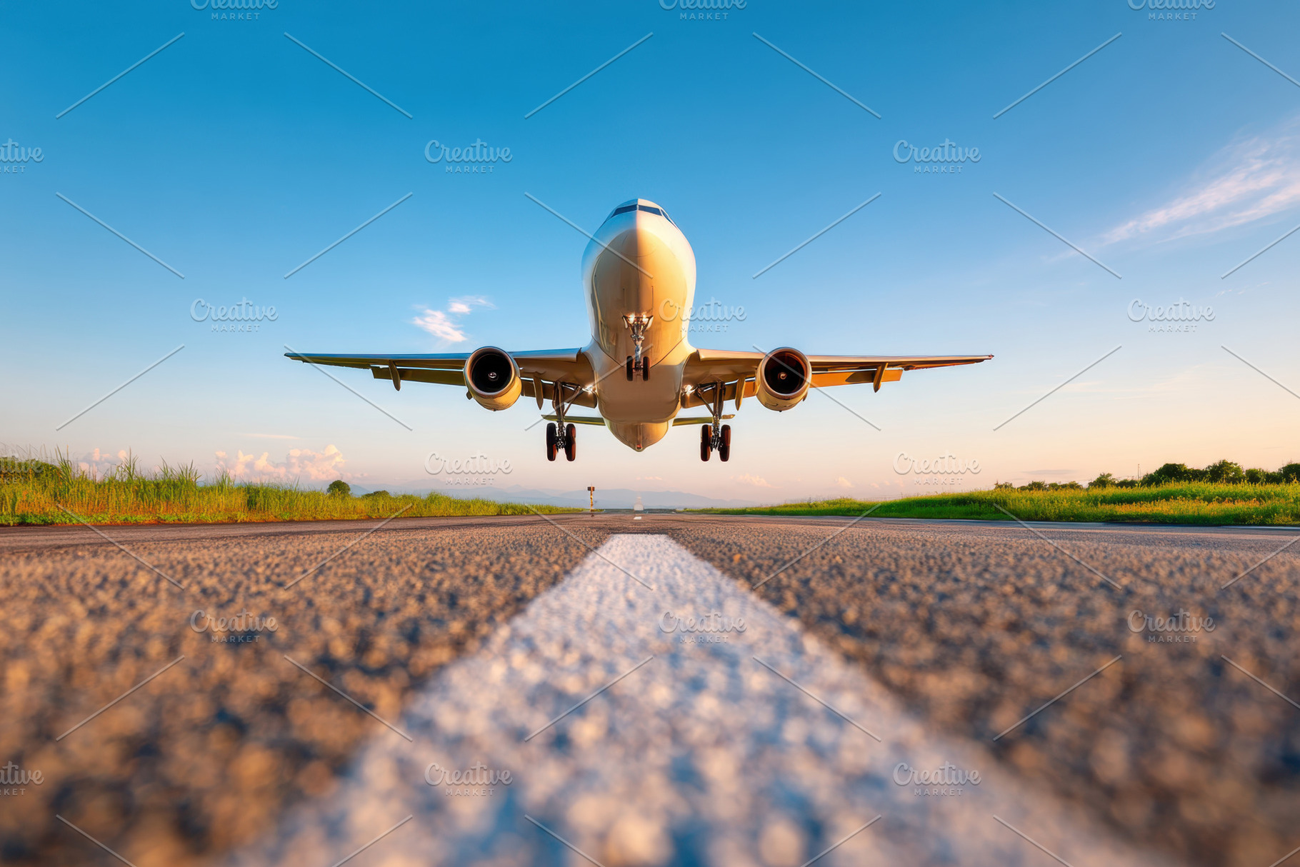 Airplane taking off from runway under blue sky, a Transportation Photo by AlyaAnd