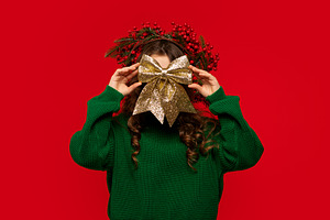 Young girl playfully, a Holiday Photo by Elena Vagengeim