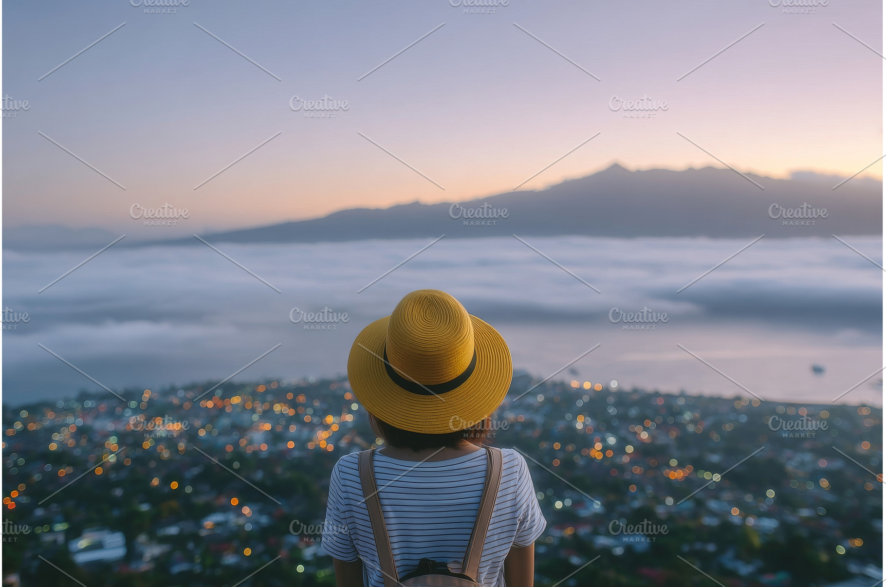 A woman stands at the top of Mount, a Person Photo by ZinetroN