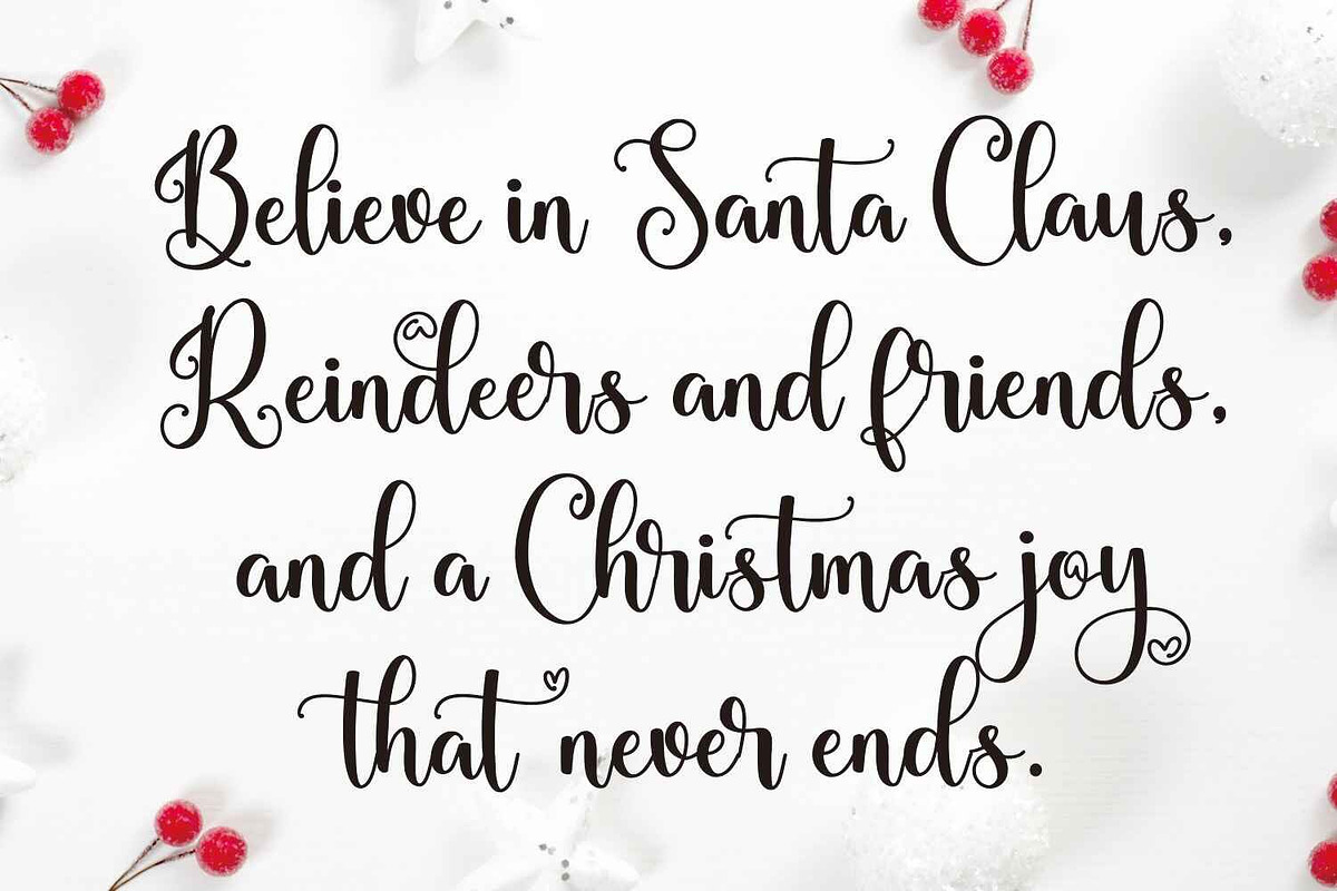 Christmas Holiday, a Script Font by Mozatype (Photo 2 of 9)