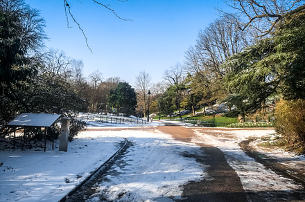 Buttes-Chaumont Park under the snow in winter, Paris, a Nature Photo by GoodGoods