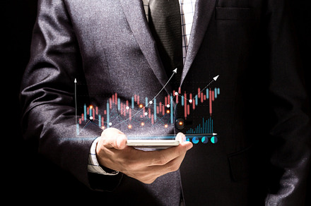 Success Businessman in elegant black suit use digital smartphone