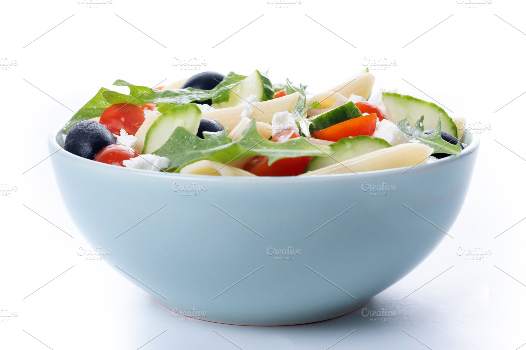 Mediterranean Pasta Salad with Fresh Vegetables and Herbs isolated on white bac, a Food & Drink Photo by etorres69