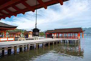 Itsukushima Shrine and iconic torii gate on Miyajima island, Jap