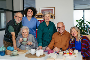 Nurse and group of elderly patients, a School & Education Photo by HalfPoint