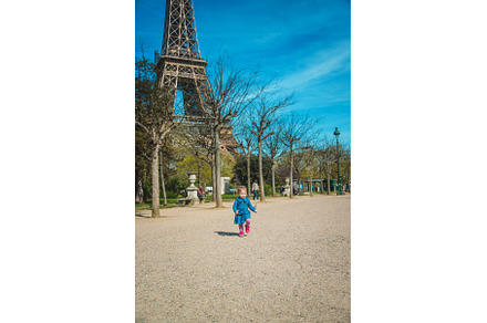 Children in Paris near the Eiffel, a Person Photo by yanadjana