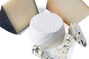 Different cheeses with nuts, figs and grapes, a Food & Drink Photo by etorres69
