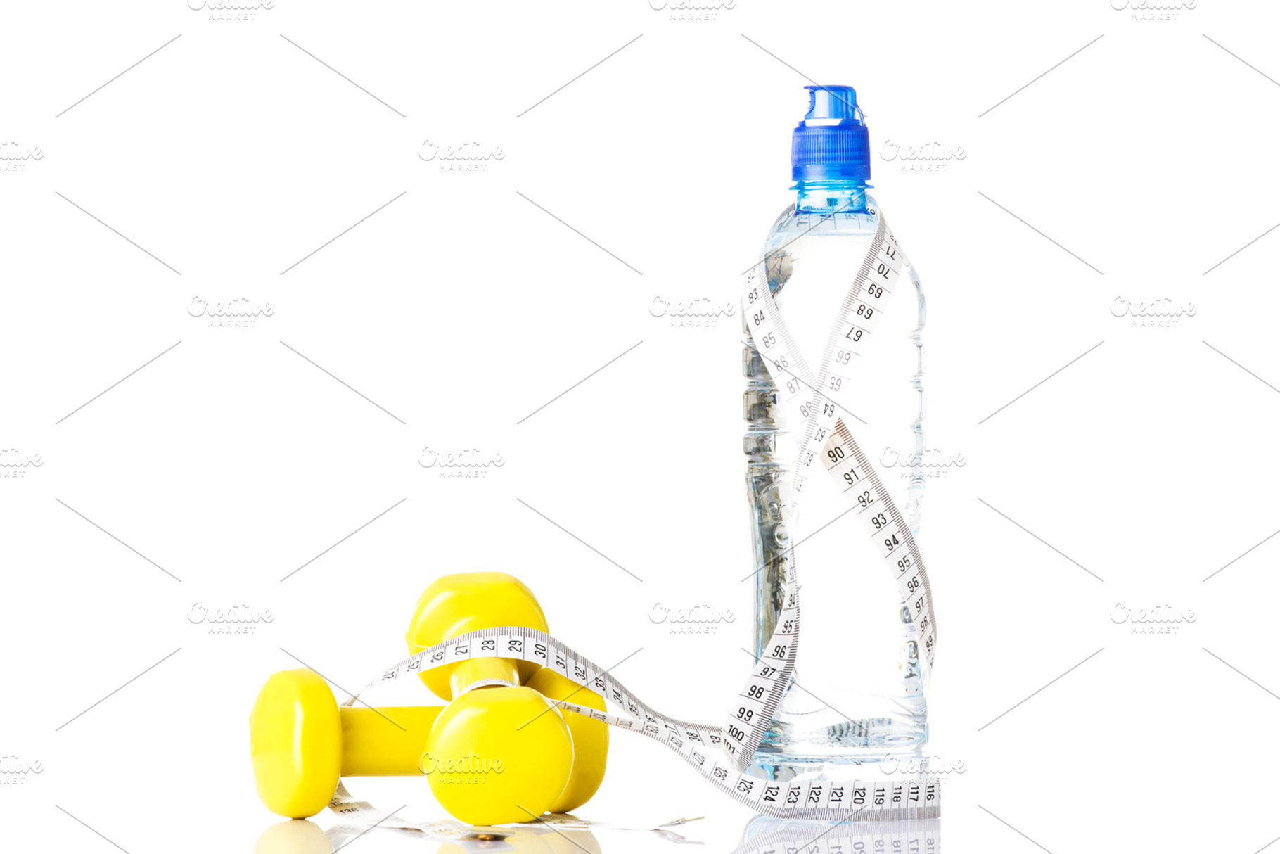 Bottle of water with measuring tape and weights., a Sports & Recreation Photo by PhotoMediaGroup