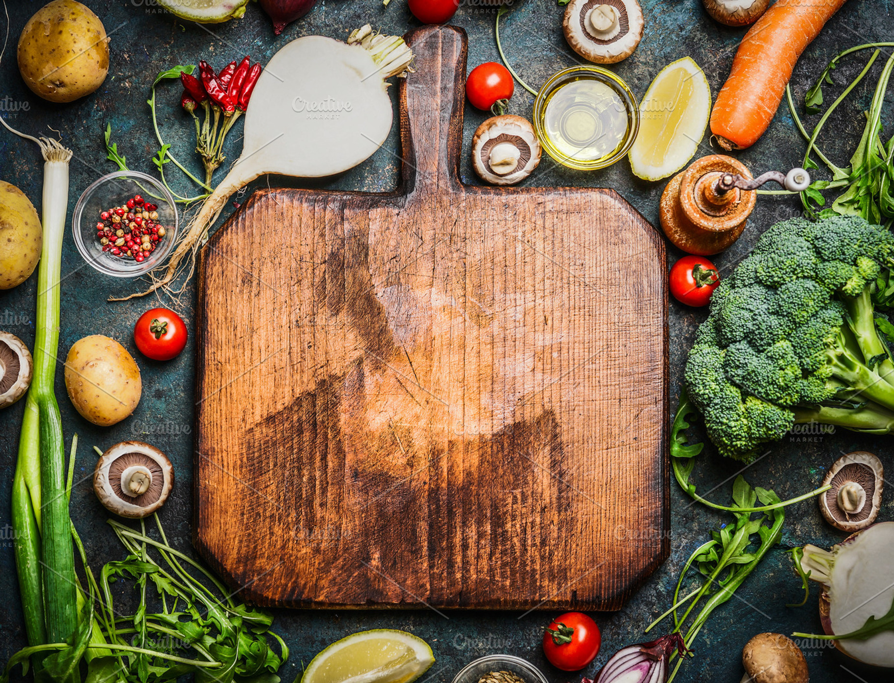 Vegetables around cutting board, a Food & Drink Photo by VICUSCHKA