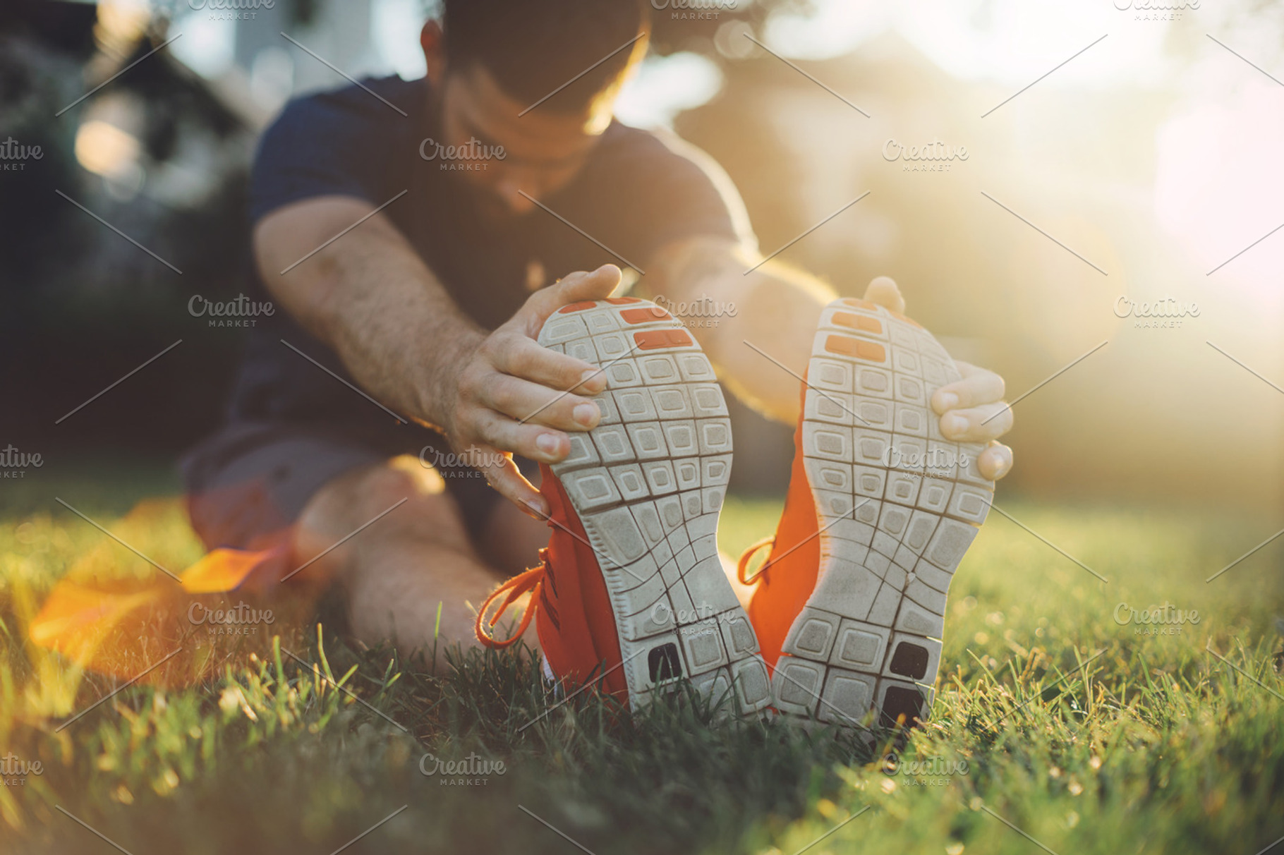 Man runner stretching legs, a Background Photo by Anastasia Dudka