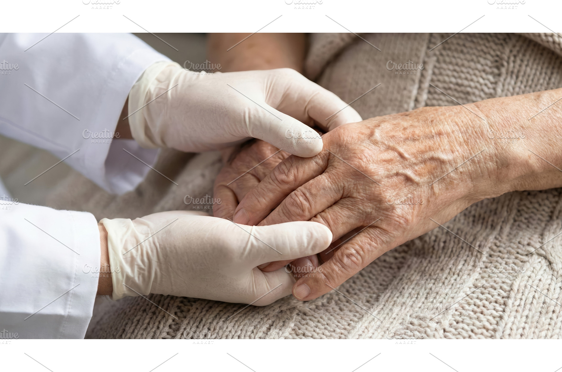 Senior Man Receives Hand Care, a Health & Medical Photo by CREATIVEDEF