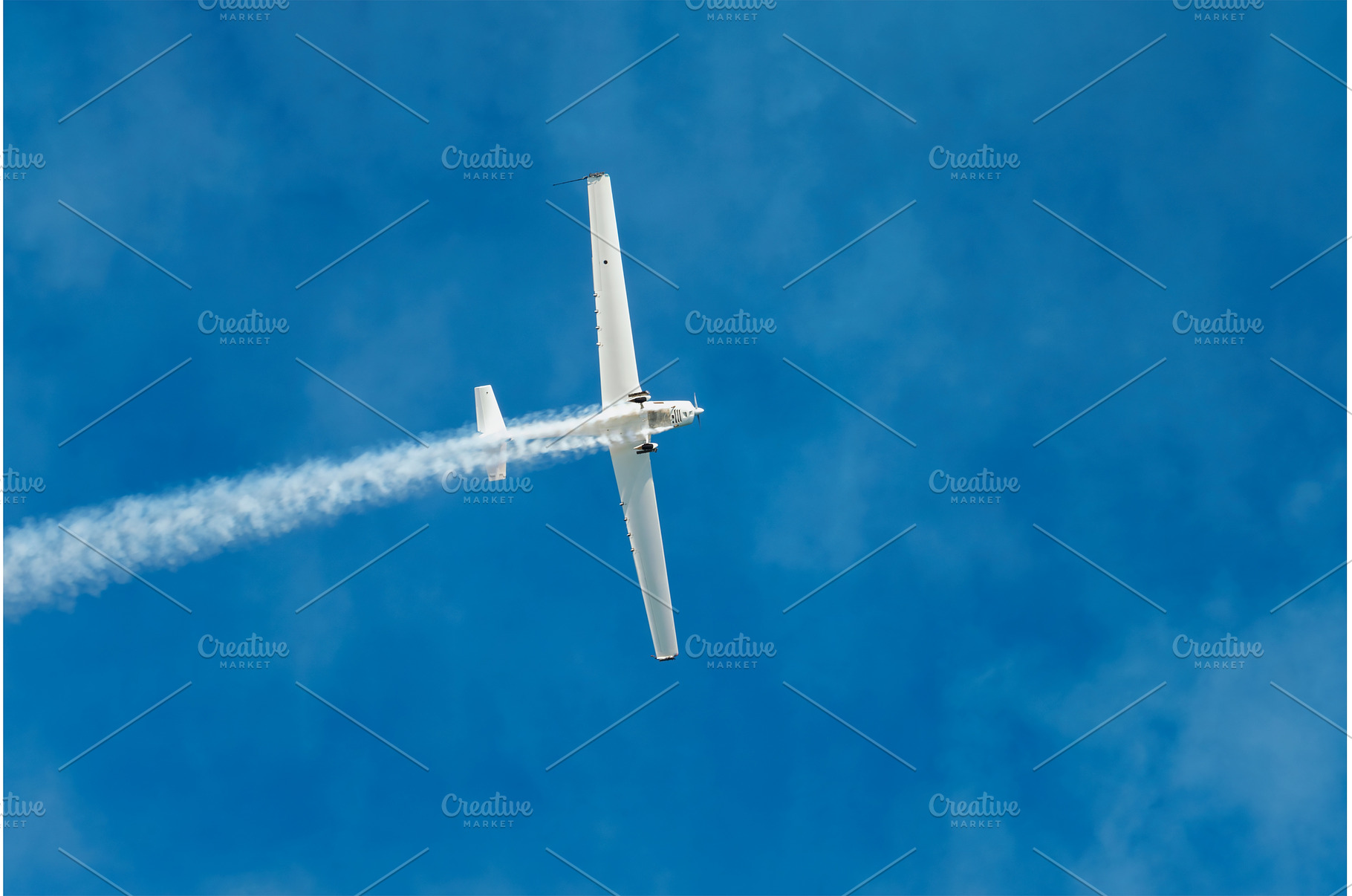 Stunt aerobatic plane performing, a Nature Photo by f9photos