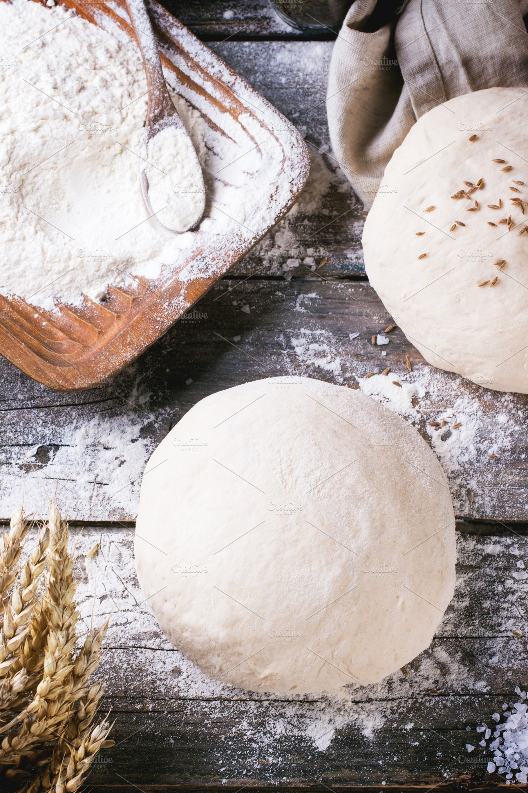 Baking bread featuring dough, bread, and flour