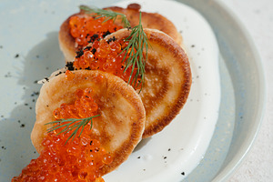 Pancakes with Salmon Roe, Sour Cream, a Food & Drink Photo by Fascinadora