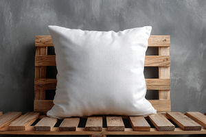 White pillow on wooden pallet bench, a Photo by Pixeness Studio