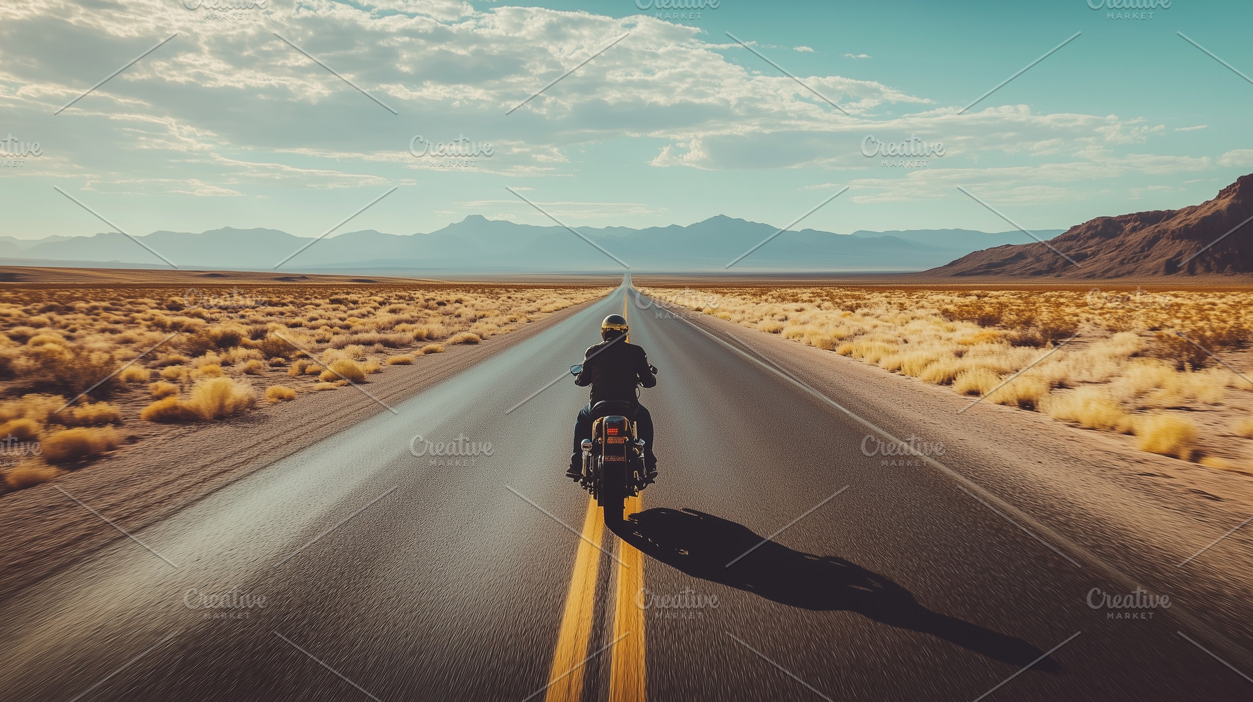 Motorcyclist rides down an highway, a Transportation Photo by MistyDay
