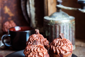 Chocolate cupcakes containing background, bakery, and birthday