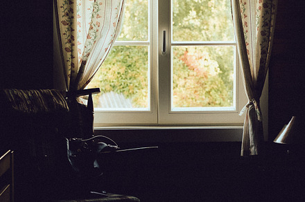 Old village house window featuring real light, window, and interior