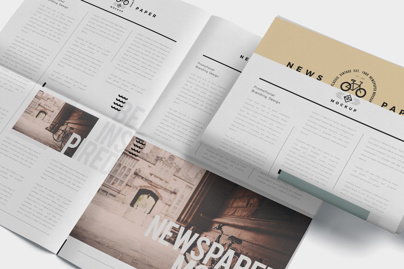 Tabloid Size Newspaper Mockups, a Books & Magazine Mockup by GfxFoundry