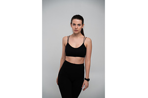Young athletic woman in black, a Sports & Recreation Photo by volodymyrshtun13795