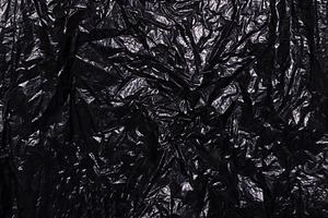 Black plastic bag. The concept of us