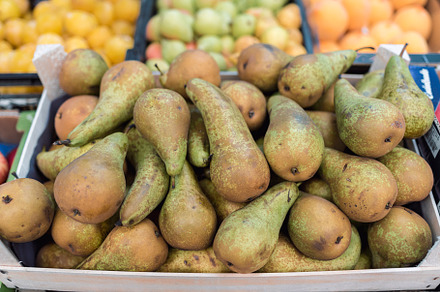 a bunch of pears in a fruit stand, a Food & Drink Photo by YossSabalet