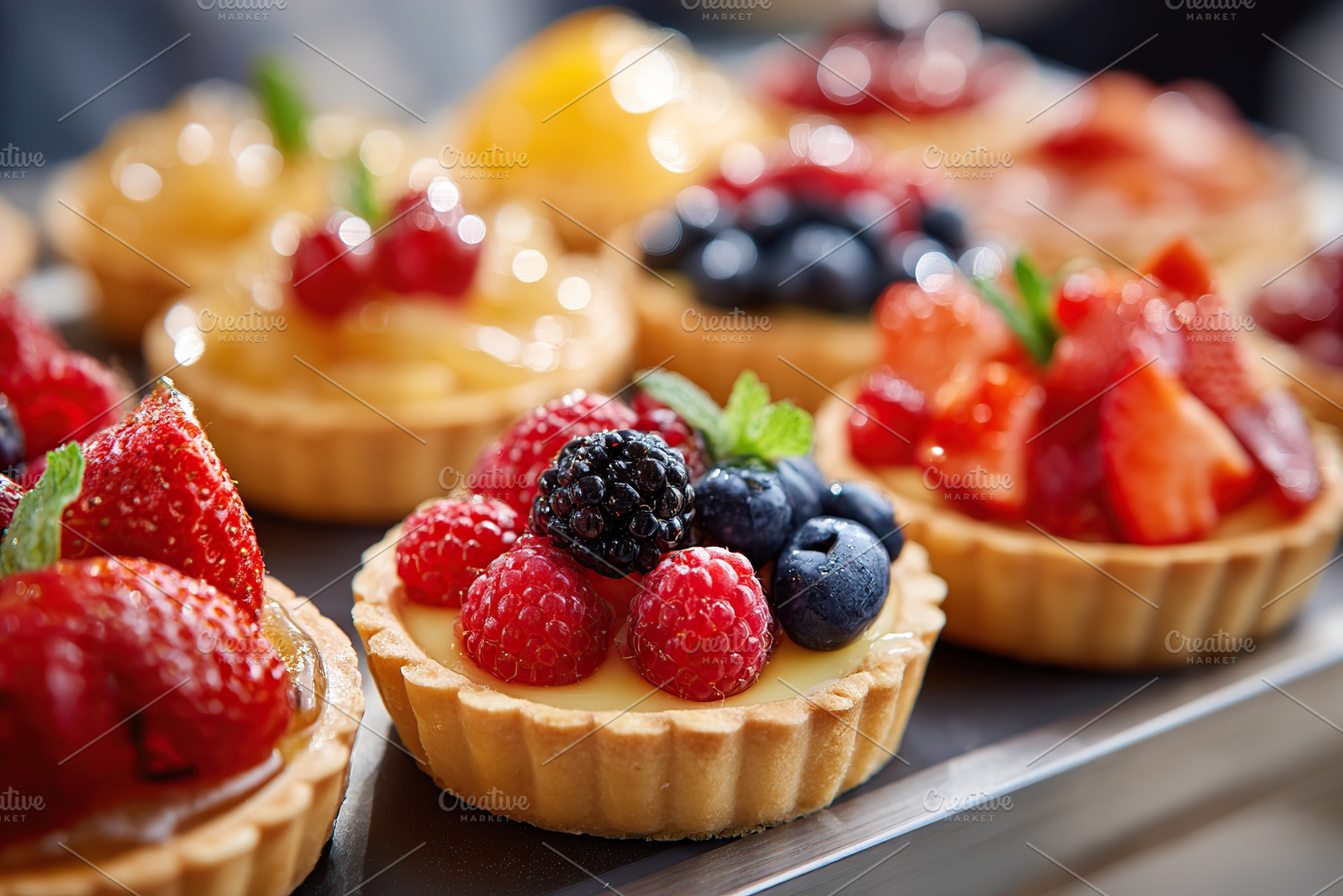 Delicious fruit tarts topped with fresh berries and custard at a dessert displa, a Food & Drink Photo by AlyaAnd