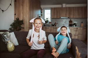 Brother and sister wearing bunny, a Holiday Photo by HalfPoint