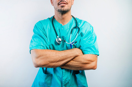 Close-Up of Doctor with Arms Crossed