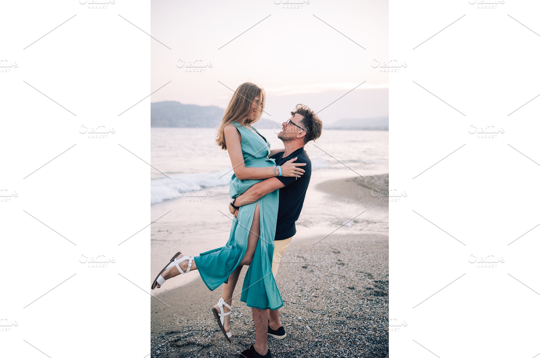 Happy Couple Embracing on a Sandy, a Person Photo by Jan Jack Russo Media