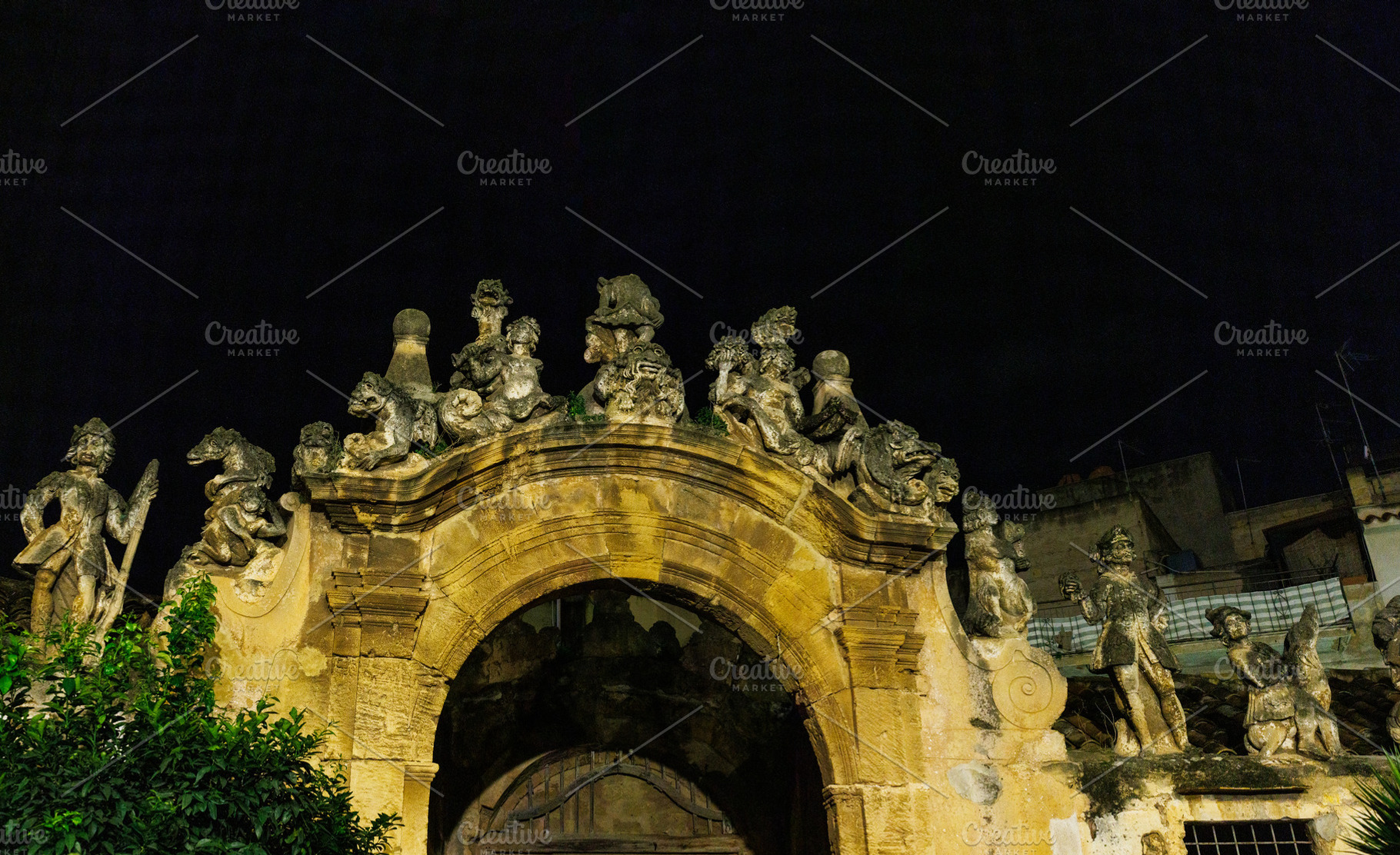 Night view of people and monster sculptures made of tuff in the, an Architecture Photo by Bepslabor