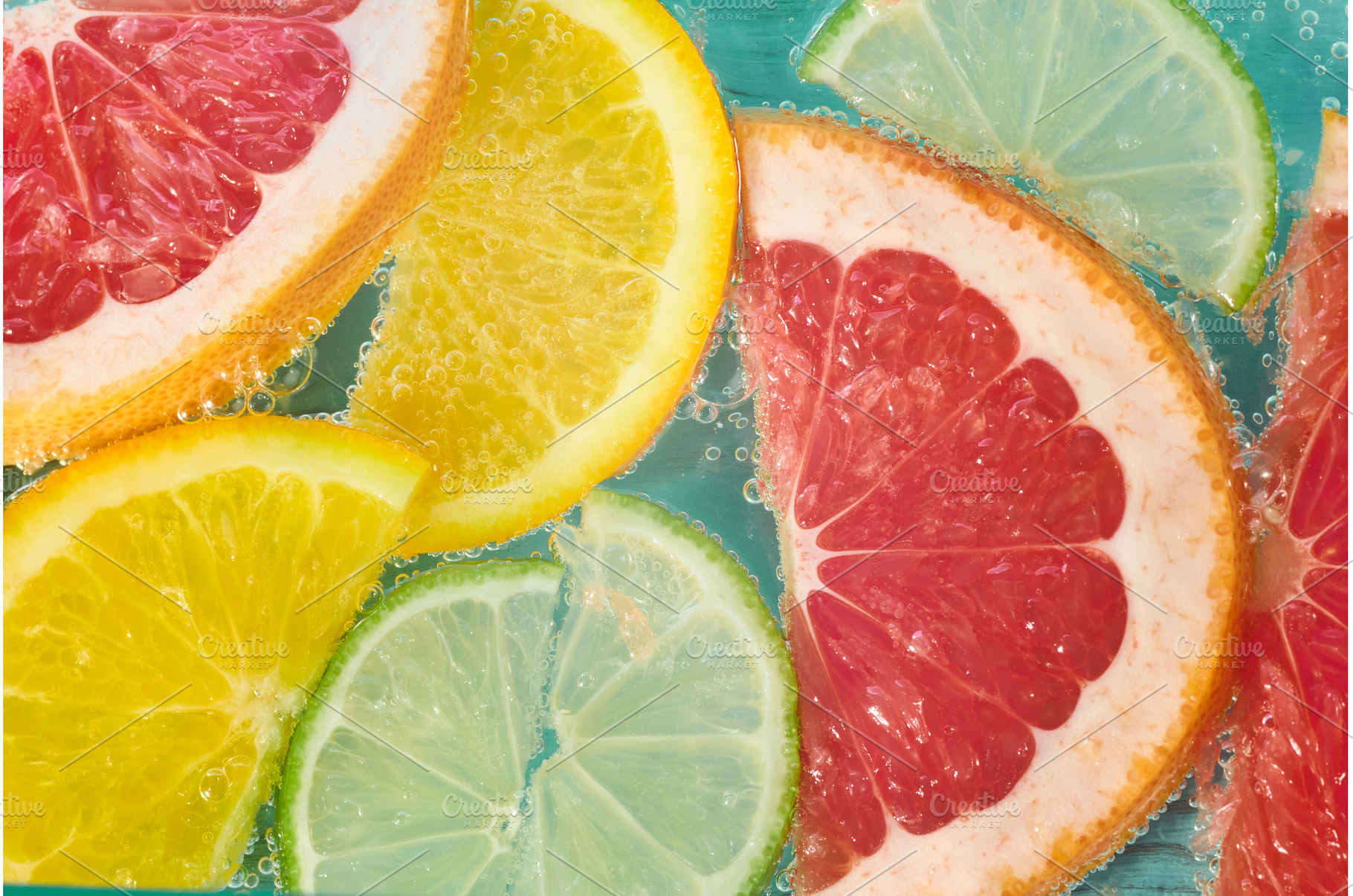 Bright slices of grapefruit, lime, a Food & Drink Photo by darksoul72