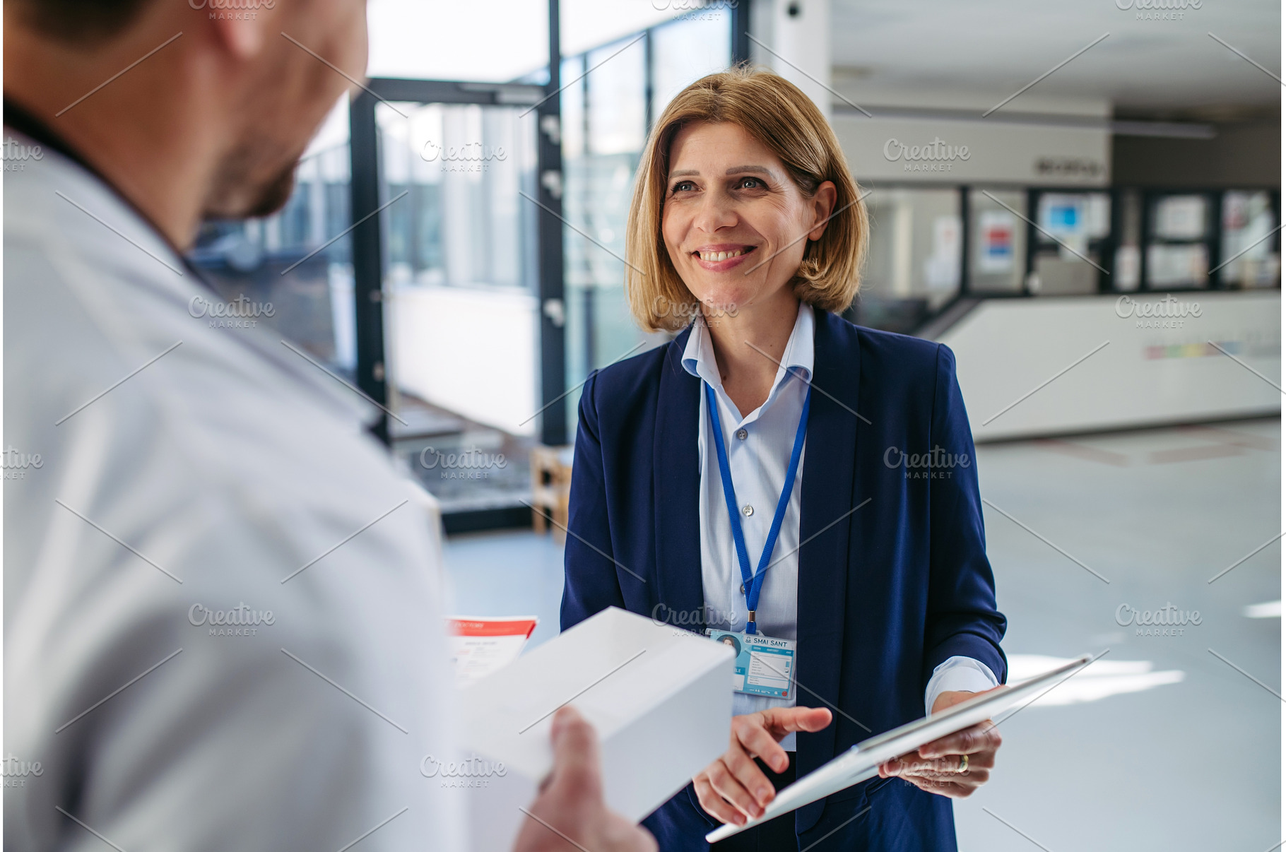 Female medical sales representative, a Business Photo by HalfPoint