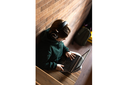 Teenager girl with laptop in, a School & Education Photo by MAnuta