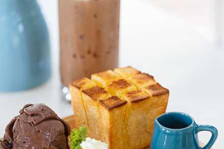 Delicious dessert with chocolate ice cream, toast, and banana slices, a Food & Drink Photo by a454