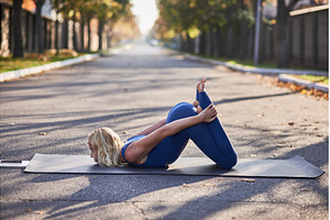 Woman Practicing Yoga in Bow Pose on, a Person Photo by wip3out