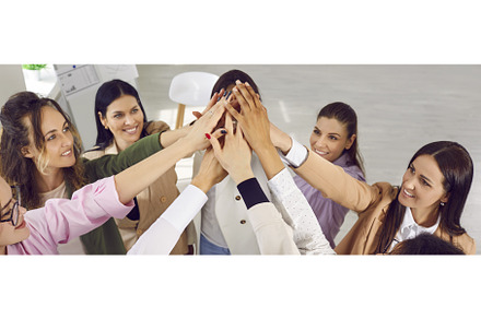 Group of cheerful young woman doing