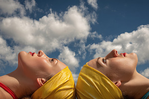 Women in bright scarves enjoy sun, a Photo by Beautiful things