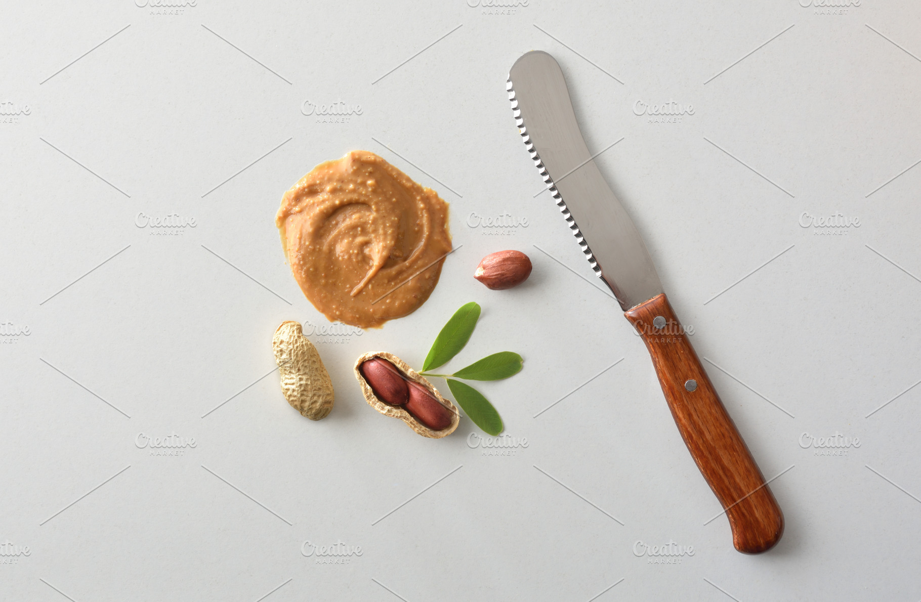 Conceptual background of peanut butter with product knife and fr, a Food & Drink Photo by Davizro's Market