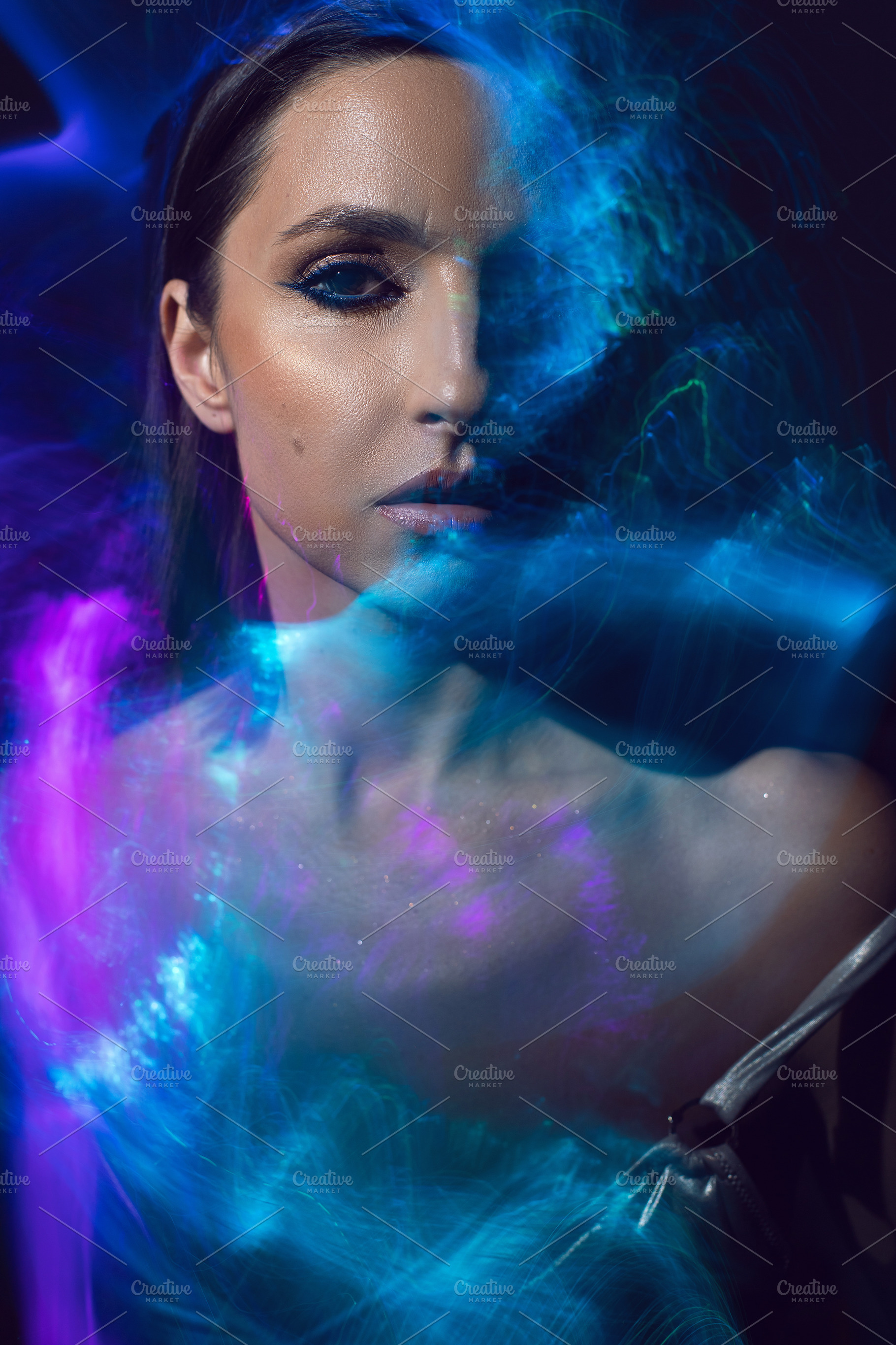 portrait cyber futuristic elegant lady in a silver swimsuit vogue look isolated, a Person Photo by SaulichPhoto