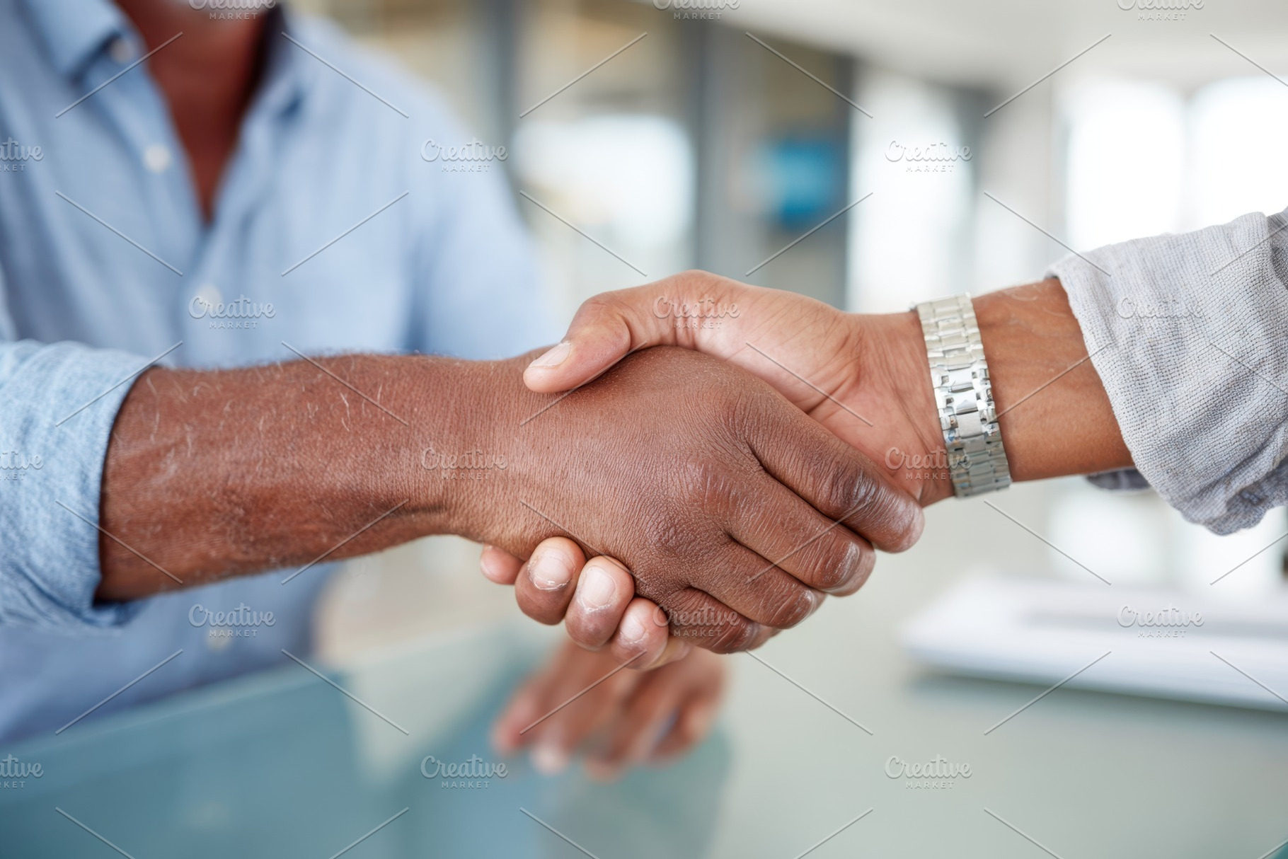 Business handshake symbolizing partnership and agreement, a Business Photo by AlyaAnd