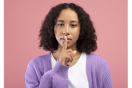 Shh, keep silence, confidential, a Person Photo by Prostock-Studio