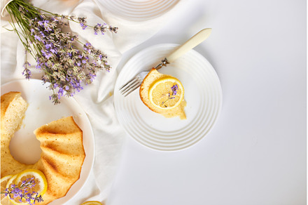 Top view Piece of lemon cake on, a Food & Drink Photo by IlliaBondarPhotography