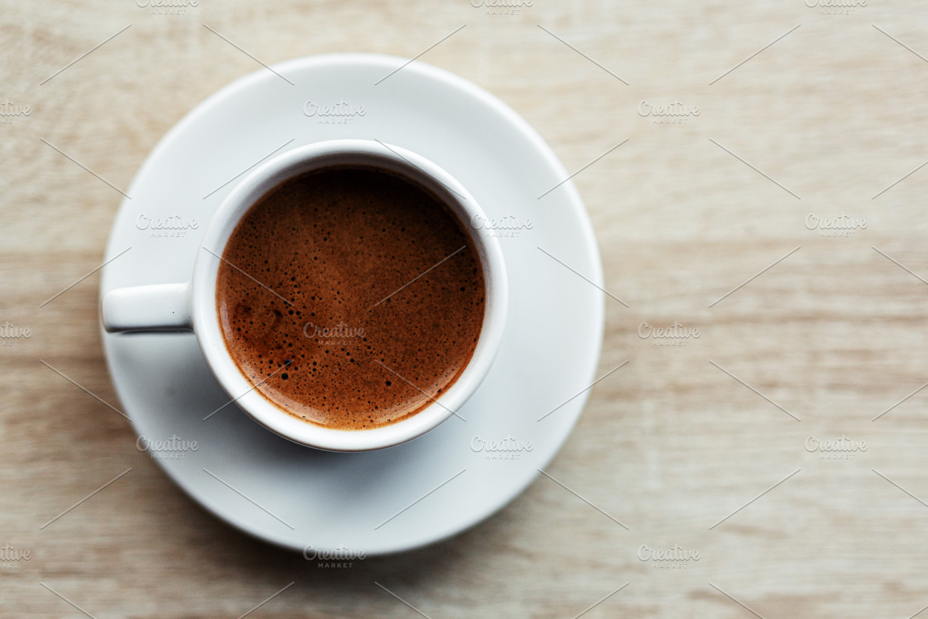 Espresso coffee served in cup, a Food & Drink Photo by Valeria Art