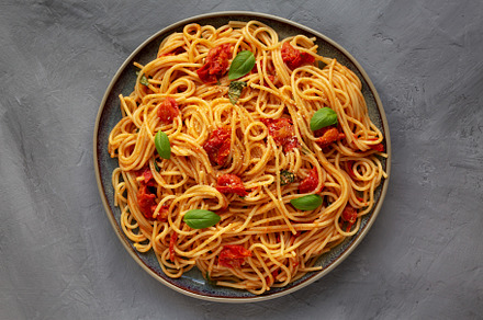 Homemade Spaghetti Pasta with Fresh Tomato Sauce on a Plate on a, a Food & Drink Photo by LiudmylaChuhunova