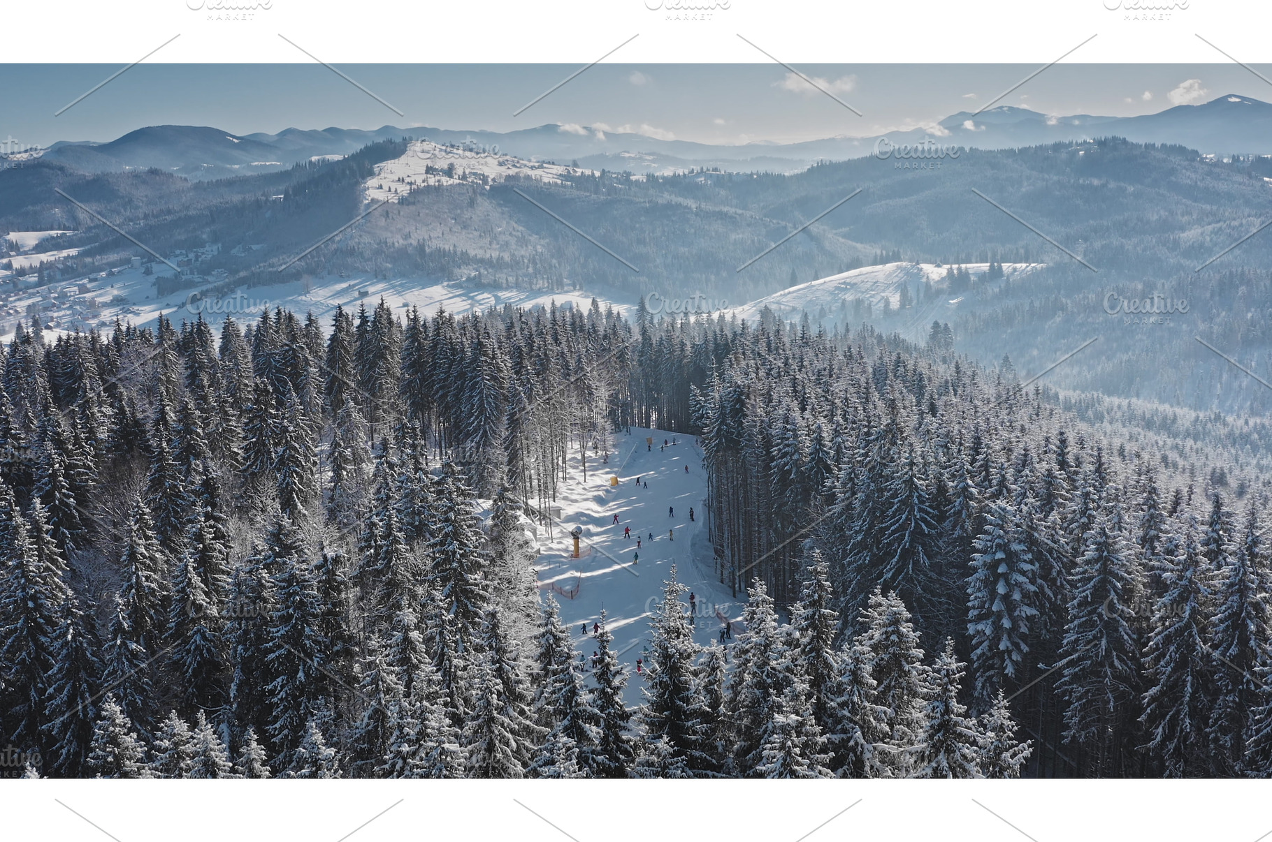 Skiers enjoying winter sports on, a Nature Photo by Goinyk