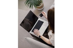 Faceless woman, home online banking, a Business Photo by Fascinadora